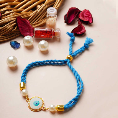 Gold Lined Round White Evil Eye Rakhi