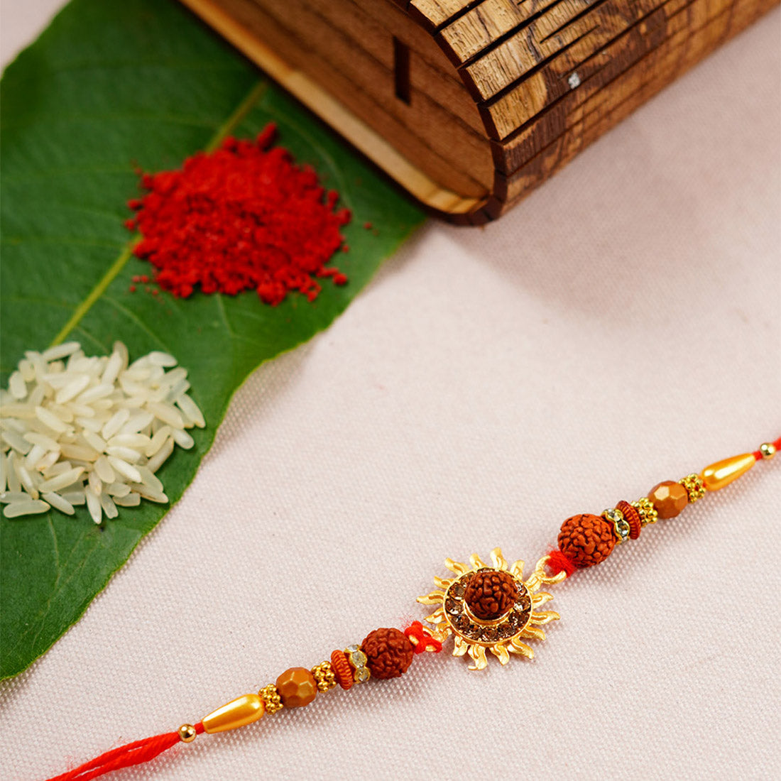 Sun Motif Rudraksh Religious Rakhi