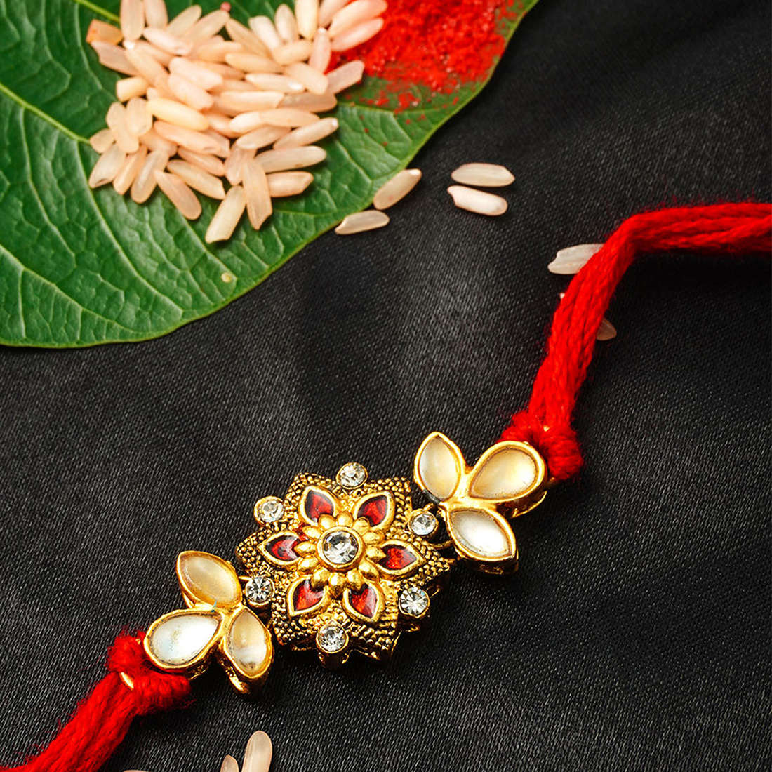 Maroon Crystal Gold Flower Red Thread Rakhi