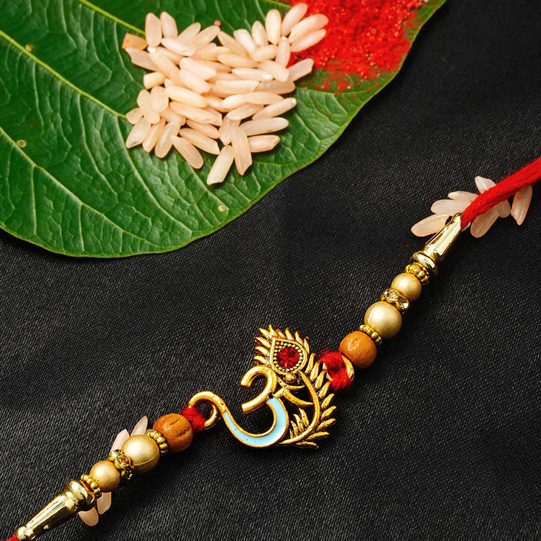 Buy Online Om Red Mor Pankh Rakhi -Urmika – Ferosh